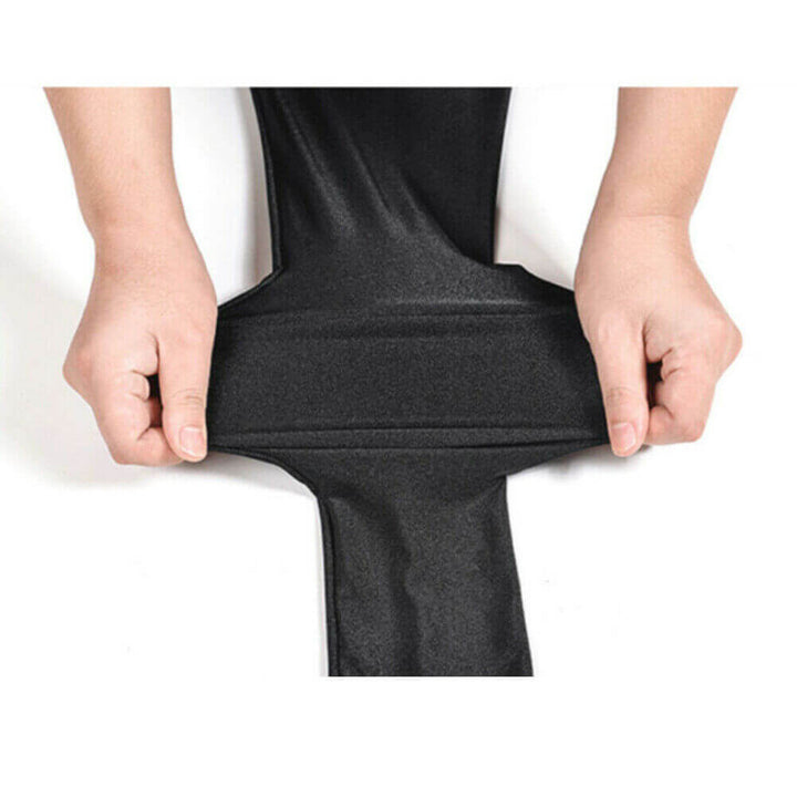 Leggings Aurafit negras brillantes, presentadas en un ajuste cómodo y moderno para ejercicios y uso diario.