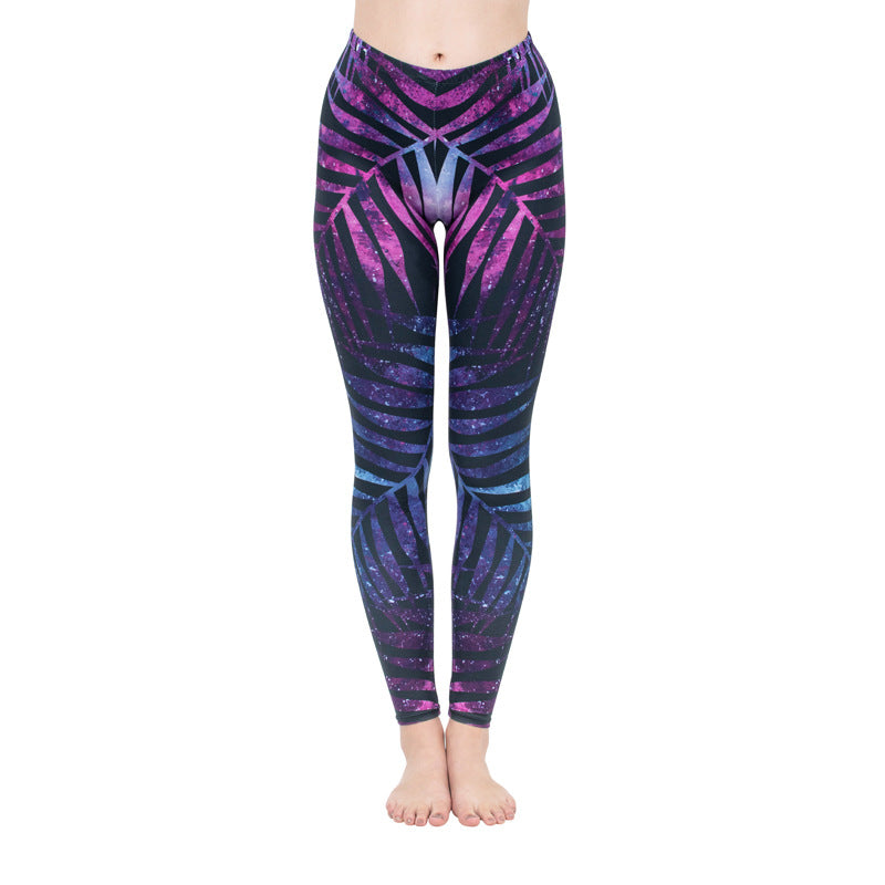 Leggings Aurafit para mujeres, con diseño impreso en tonos púrpuras y azules, ideales para actividades deportivas.