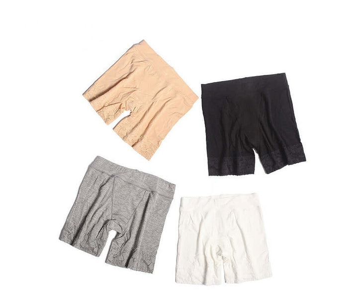 Leggings Aurafit de mujer de tres cuartos en negro, ideales para actividades deportivas y uso diario.